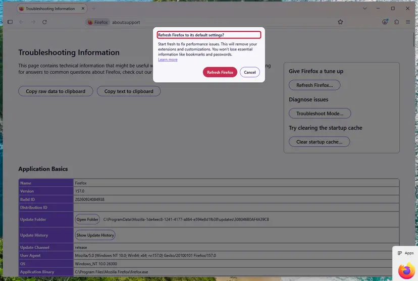 The Refresh Firefox to its default settings confirmation dialog over the Troubleshooting Information page in Firefox 157 on Windows 11