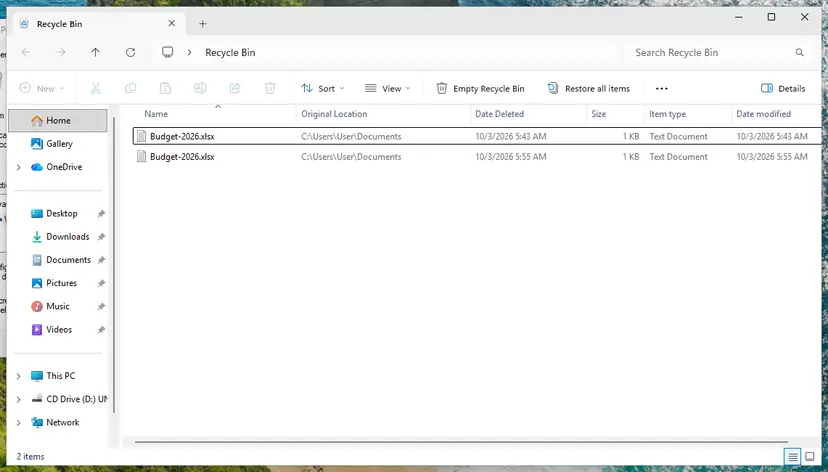 Recycle Bin in File Explorer with Original Location and Date Deleted columns: screenshot taken on Windows 11 26H2