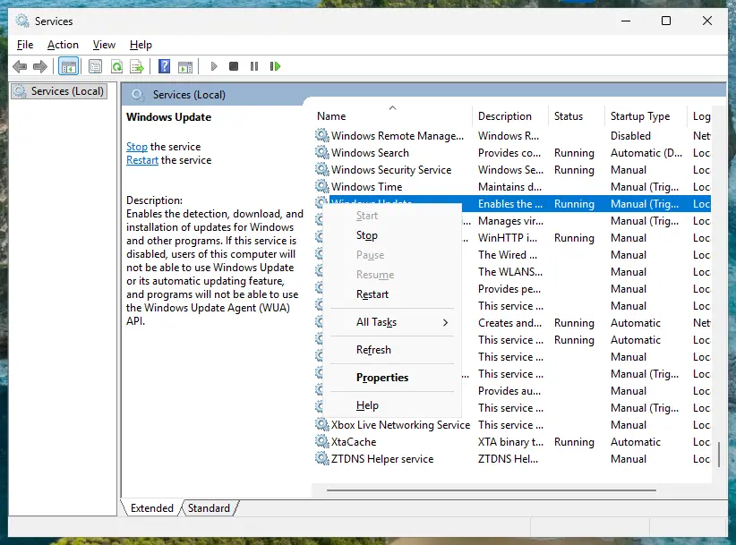 Right-click menu of the Windows Update service with Start, Stop, Restart and Properties: screenshot taken on Windows 11 26H2