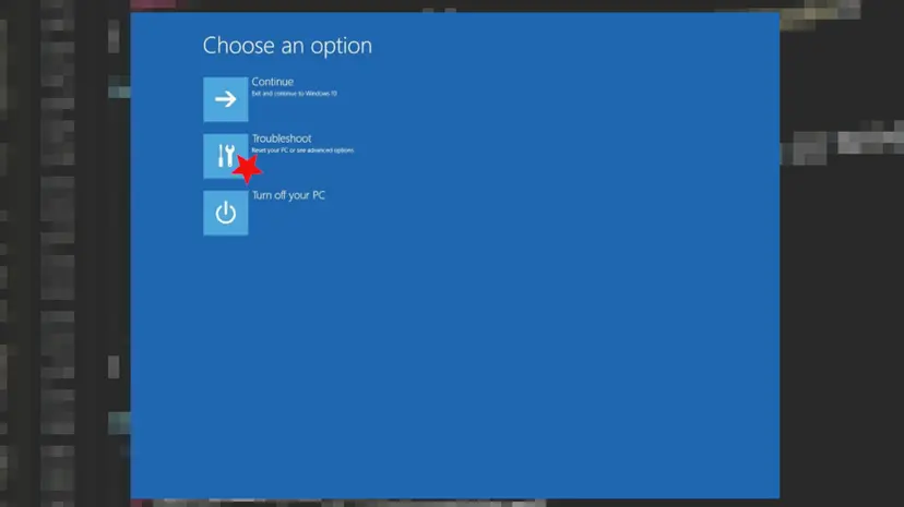 Choose an option recovery screen on Windows 10 with a red star marking the Troubleshoot tile