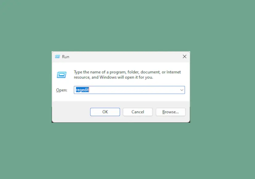 Windows 11 Run dialog with regedit typed into the Open box, ready to open Registry Editor