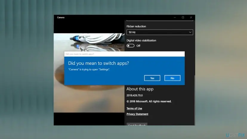 Windows 10 Camera app settings panel with a blue dialog Did you mean to switch apps saying Camera is trying to open Settings with Yes and No buttons