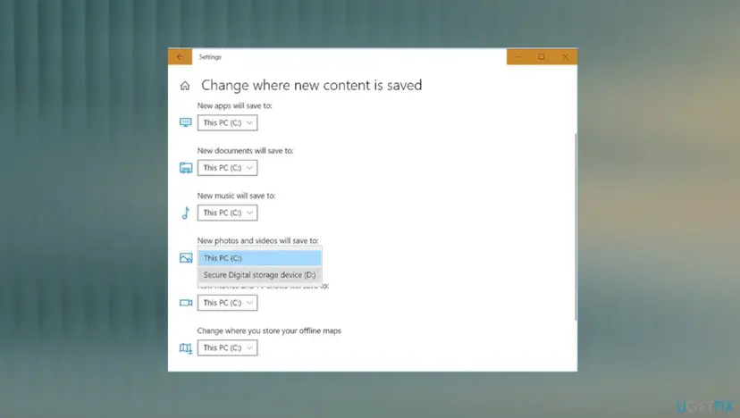 Windows 10 Settings page Change where new content is saved with the New photos and videos will save to list open showing This PC (C:) and Secure Digital storage device (D:)