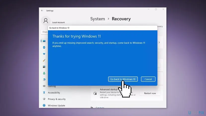 Windows 11 recovery window with the final Go back to Windows 10 button
