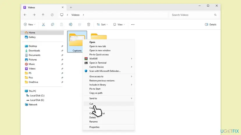 File Explorer at the Videos folder with Captures selected and the right-click menu open at Cut