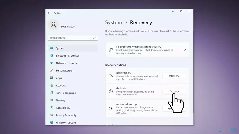 Windows 11 Settings, System, Recovery page with the Go back option under Recovery options