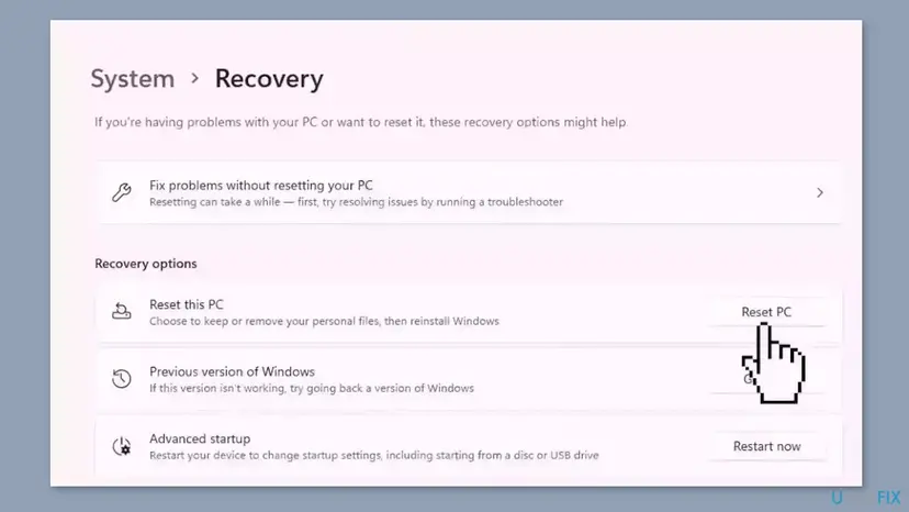 Windows 11 Settings at System, Recovery with the Reset PC button next to Reset this PC under Recovery options