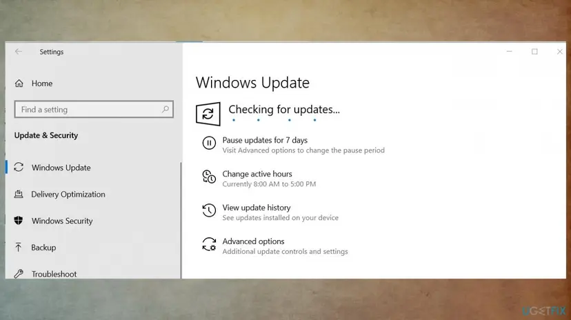 Windows 10 Settings with Update and Security open on the Windows Update page while it is checking for updates