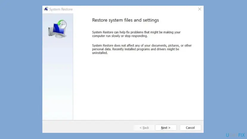 System Restore window titled Restore system files and settings with the Next button, on Windows 11