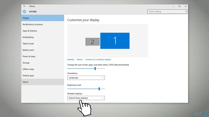 Early Windows 10 Settings, System, Display page with two screens and the Multiple displays list set to Extend these displays